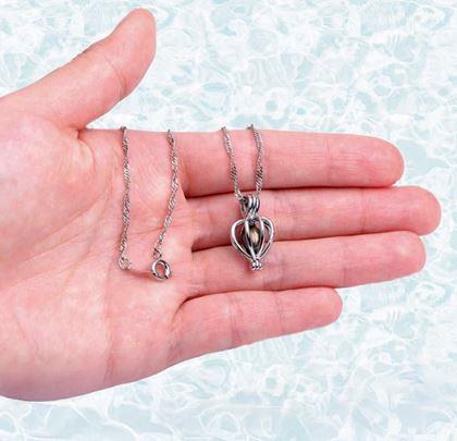 Obrázok z Perla priania v perlorodke s náhrdelníkom, náušnicami a prsteňom