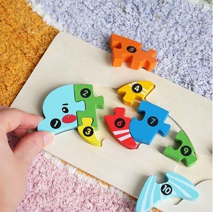 Obrázok z Drevené puzzle s číslami  -  delfín